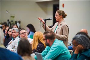 Satellite Symposium attendee asking a question